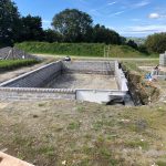 New heated swimming pool under construction at dolcoed.